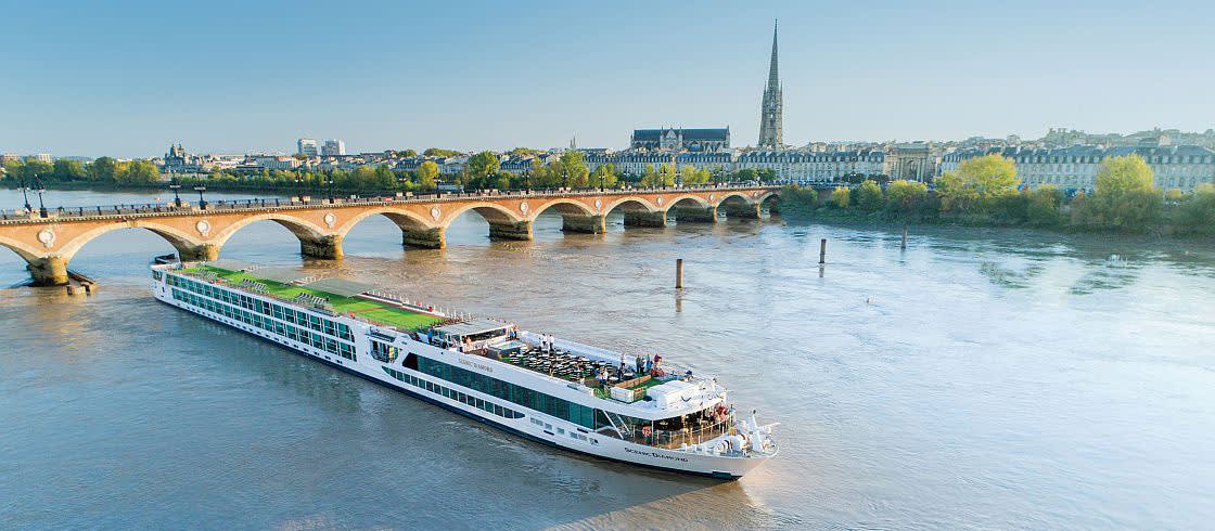 The Scenic Diamond Cruise Boat and Bordeaux Pont-de-Pierre-in the background