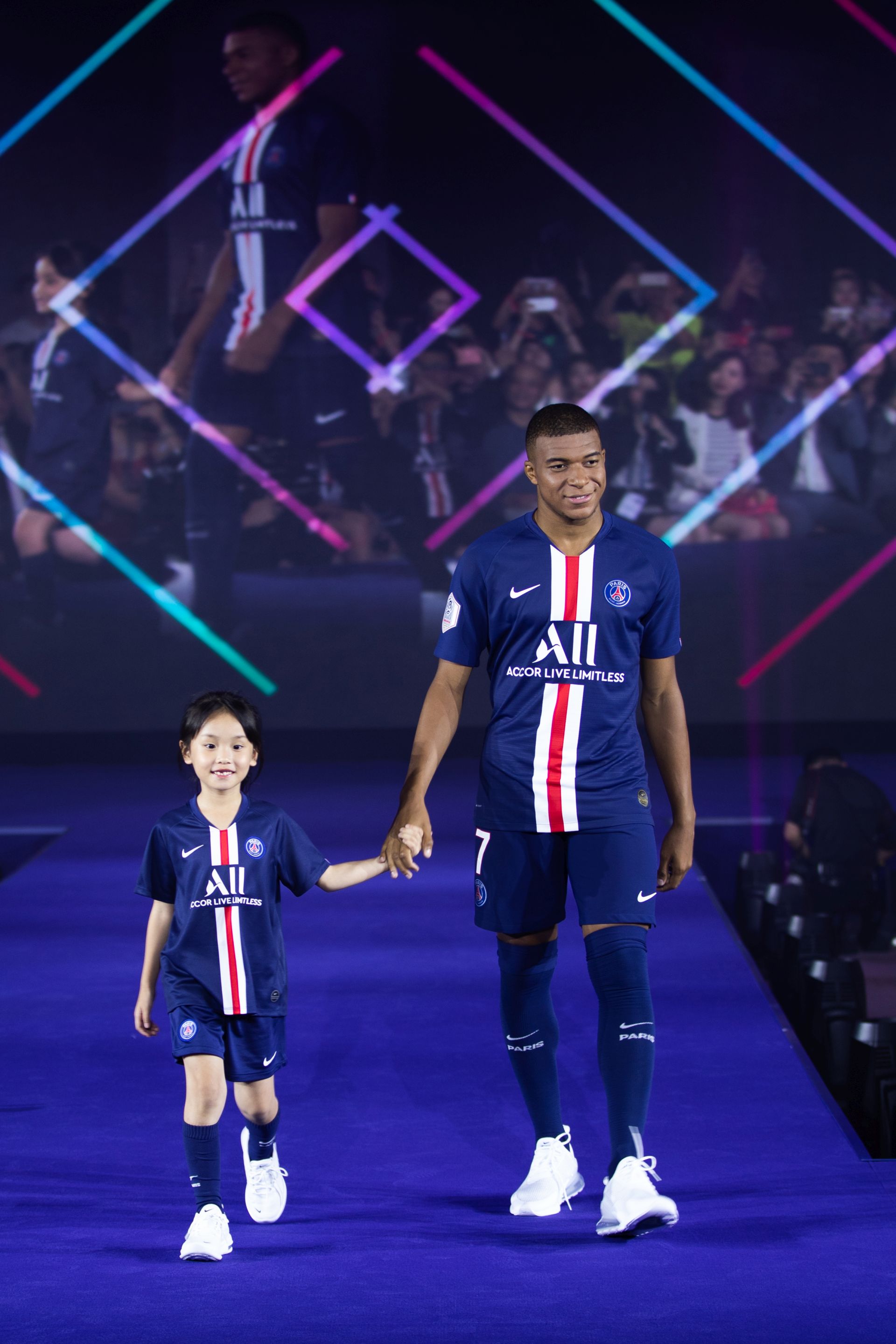 Rising star Kylian Mbappe with his entourage (photo © PSG-Accor Live)
